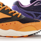 A close up look at the Mizuno logos on the shoes.
